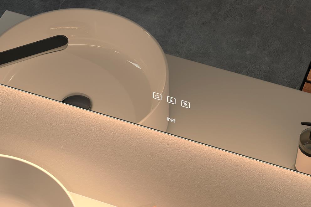 Tousc peilin alareunassa olevilla kosketuspainikkeilla voit säätää valon lämpötilaa ja kirkkautta sekä sammuttaa ja laittaa valot päälle.